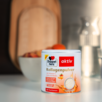 Das Produkt Doppelherz Kollagenpulver Pfirsich-Eistee steht auf dem Tisch.